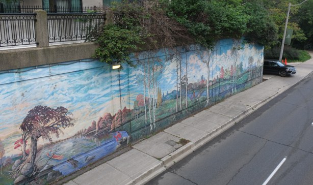 mural by Ian Leventhal, landscape, on walls of bridge, bloor over mount pleasant